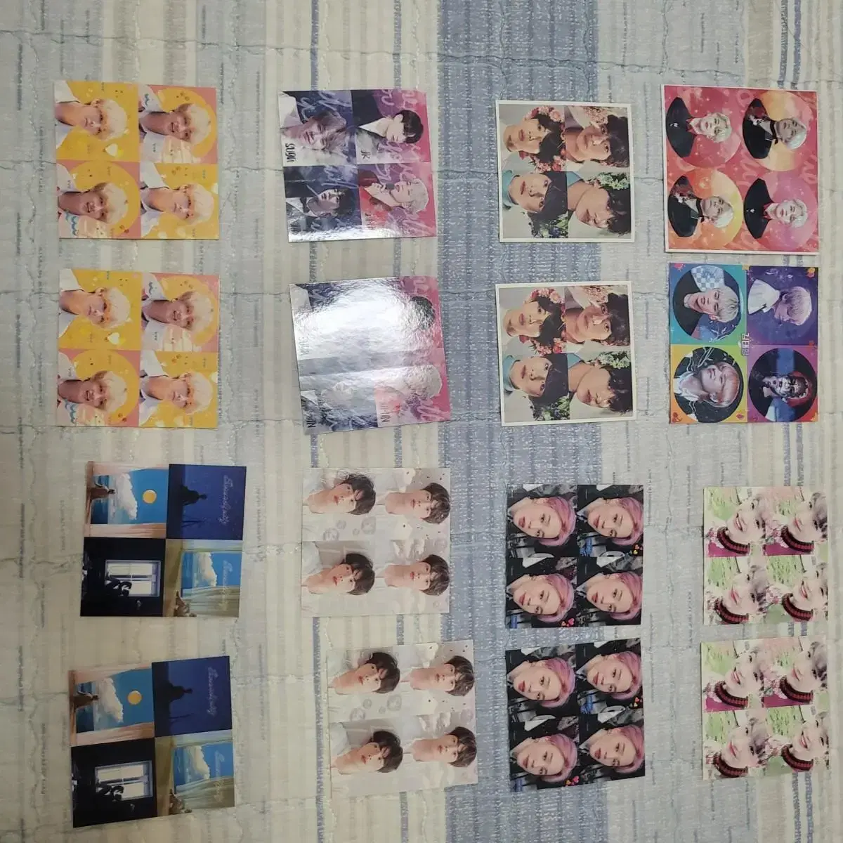 A kard with BTS stickers and four-cut photos.