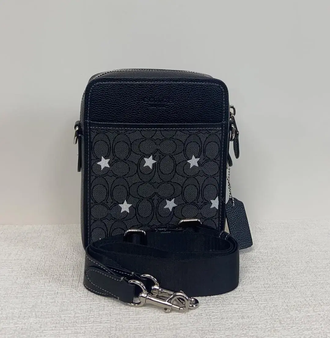 cignature Jacquard Sullivan Crossbody CP177 S in jacquard with coach star embroidery.