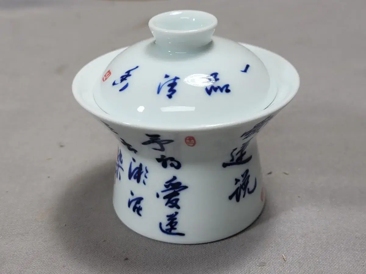 Chinese porcelain celadon and white porcelain ware with cursive inscription