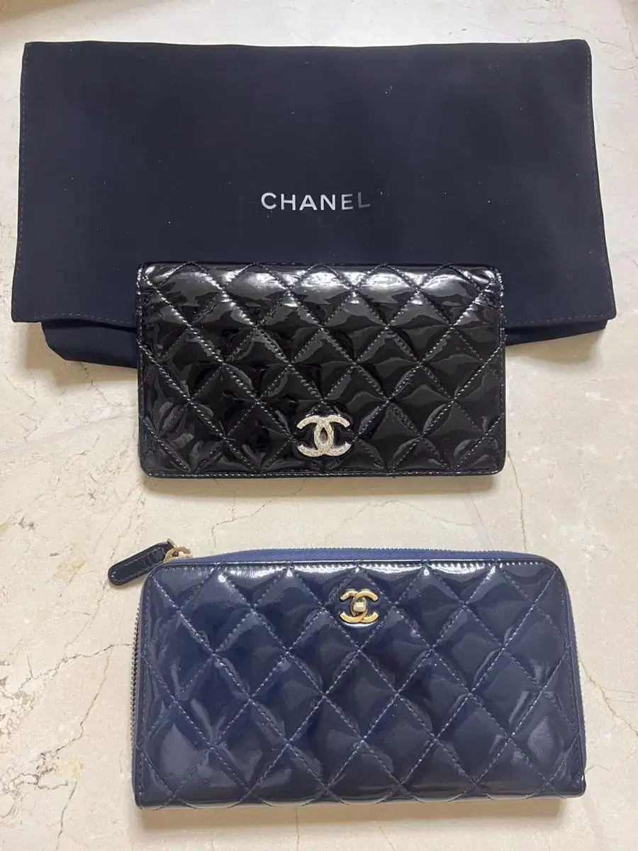 Two long Chanel Fei Dant wallets