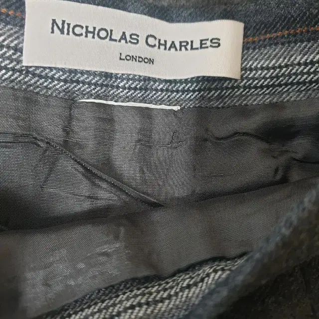 수입) NICHOLAS CHARLES플리츠울스커트