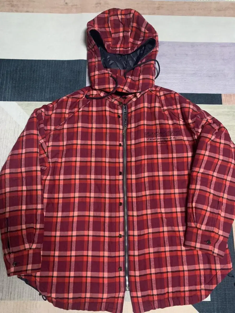 Junge check quilted jumper