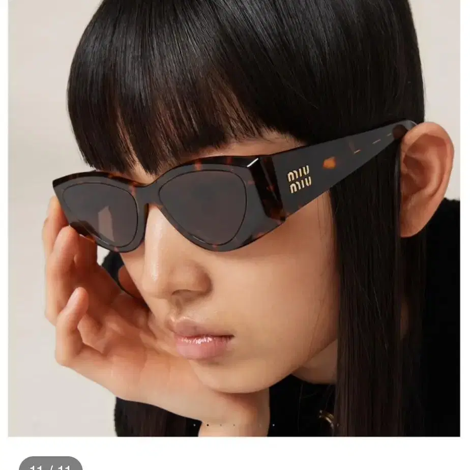 MiuMiu Cat-eye Sunglasses