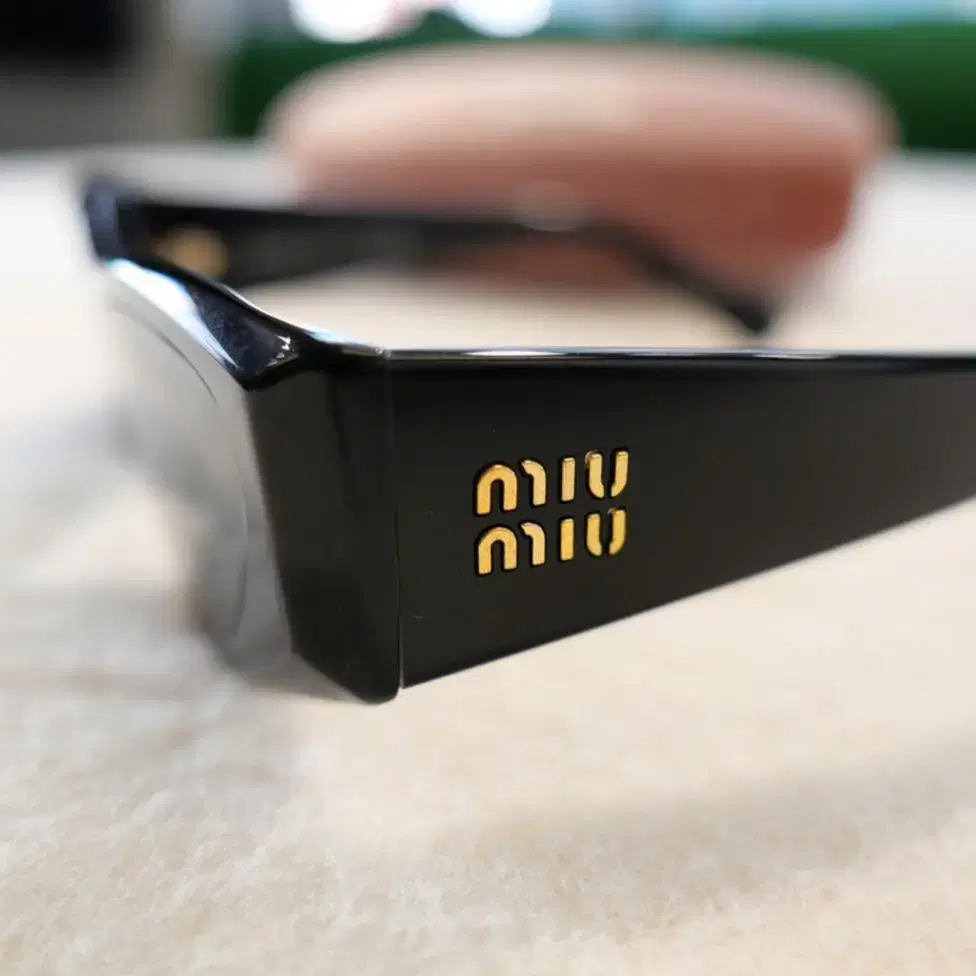 MiuMiu Cat-eye Sunglasses