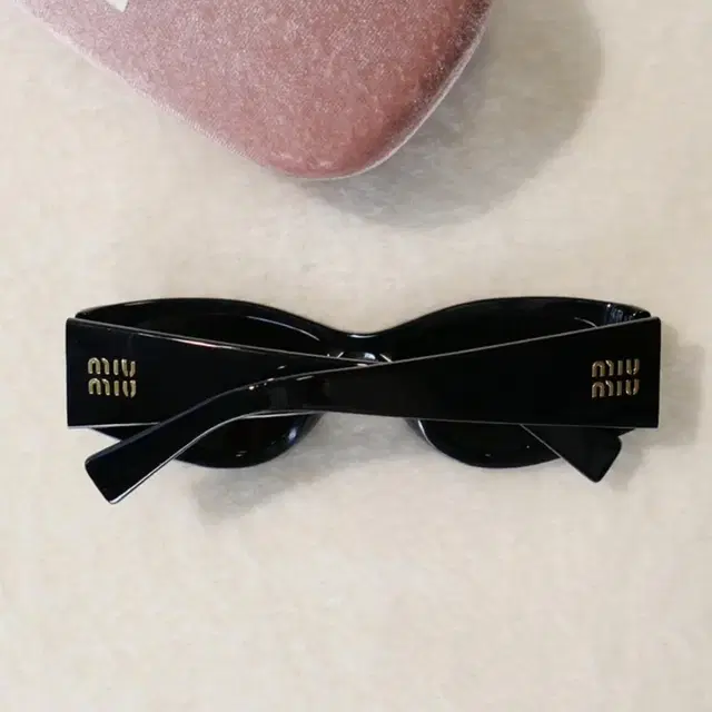 MiuMiu Cat-eye Sunglasses