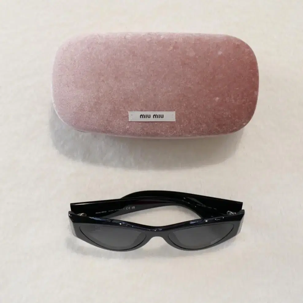 MiuMiu Cat-eye Sunglasses