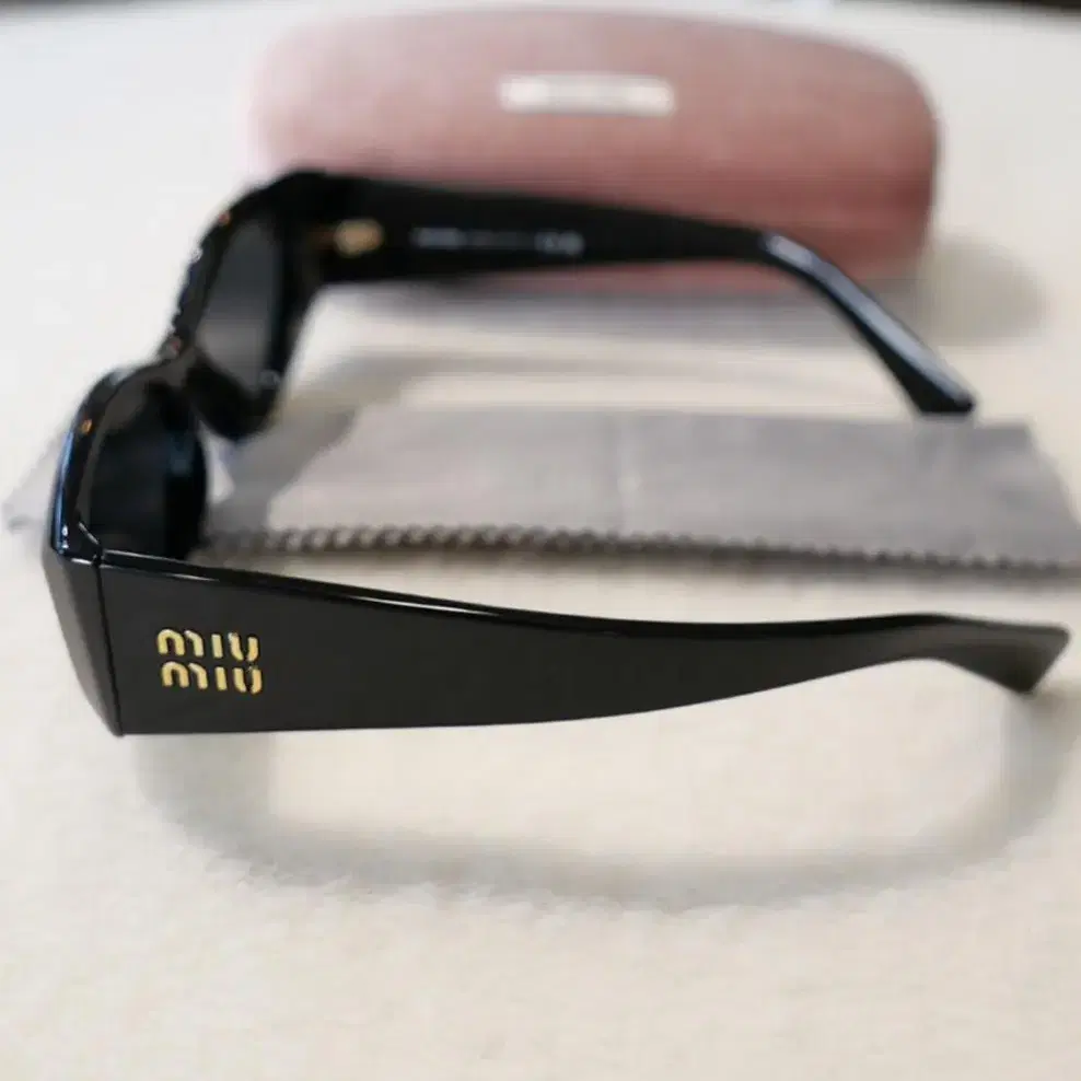 MiuMiu Cat-eye Sunglasses