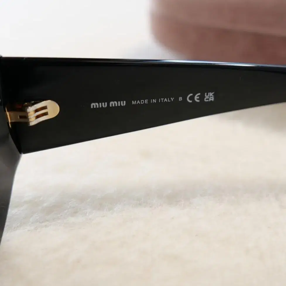 MiuMiu Cat-eye Sunglasses