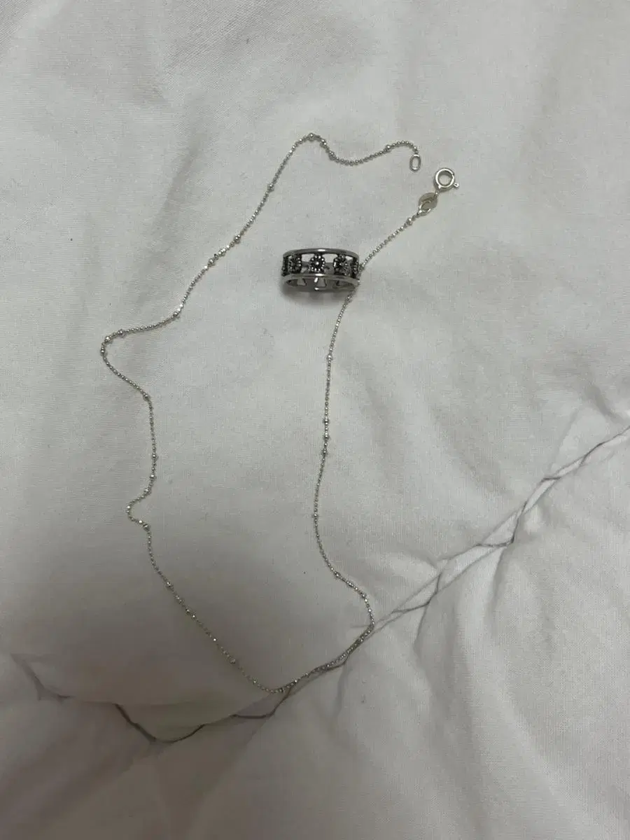 Surgery ring, silver necklace