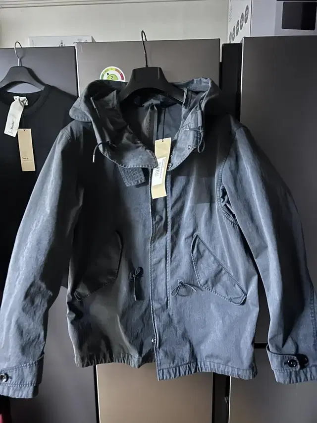 (새상품)텐씨 Ojj  Short Parka  48