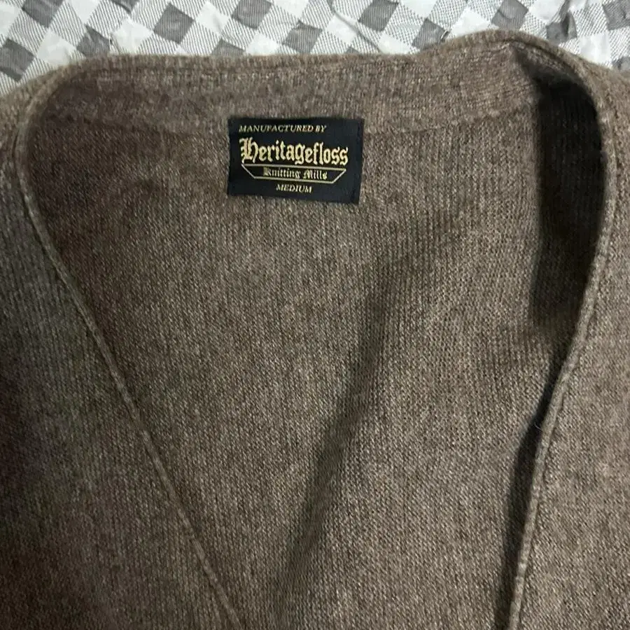 헤리티지플로스 CREST WOOL CARDIGAN