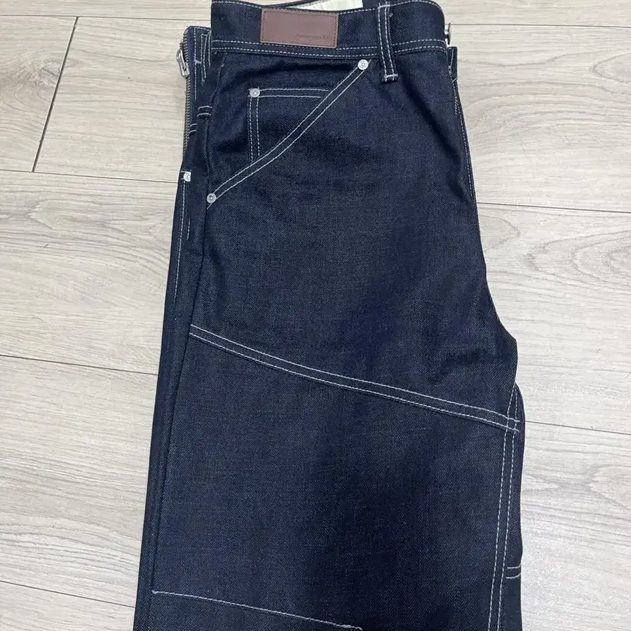 앤더슨벨 바지 데님 팬츠 ZIPPER WIDE-LEG RIGID JEAN