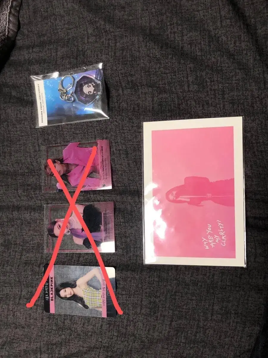 Black pink postcard, clear photocard, and keyring.