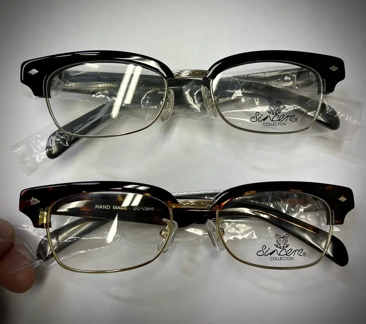 Keum framed glassesHorn-rimmed eyeglassesFrames made in JapanBlack Hopi frames