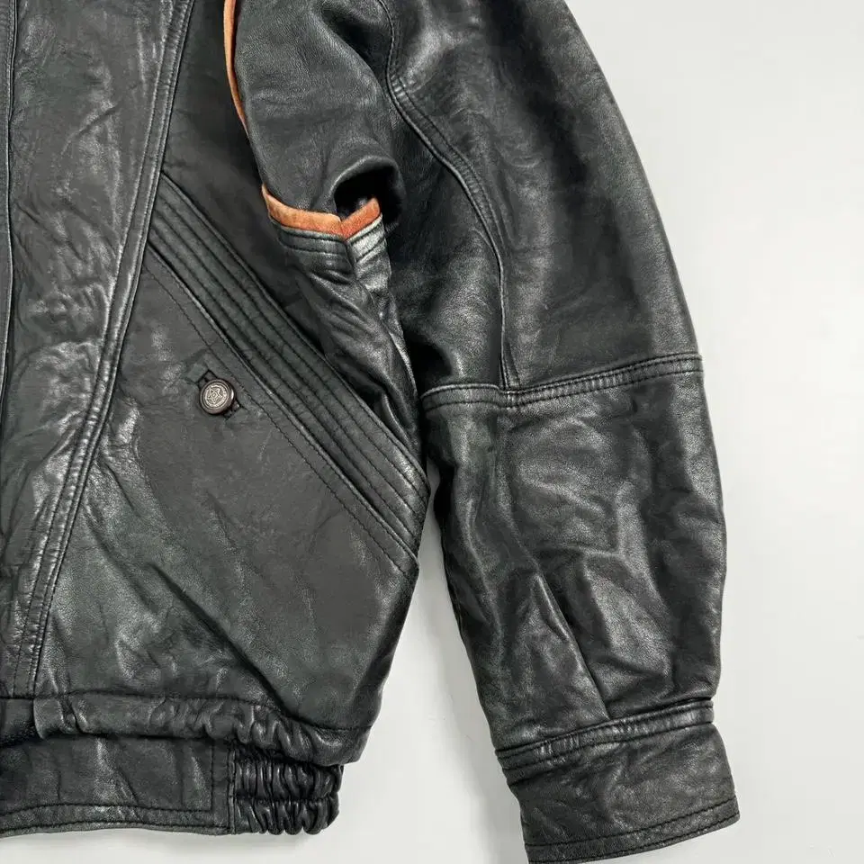 vintage aging leather bomber jacket