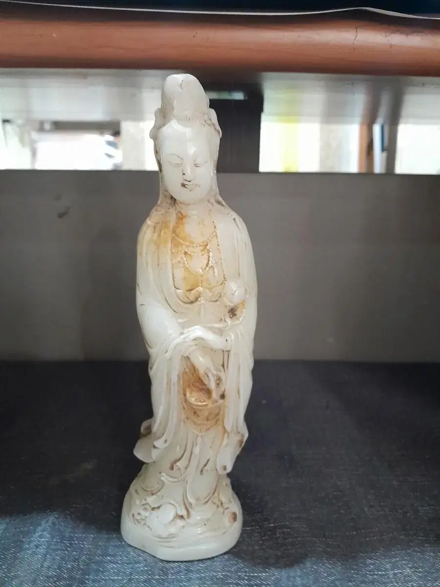 White jade Buddha statue