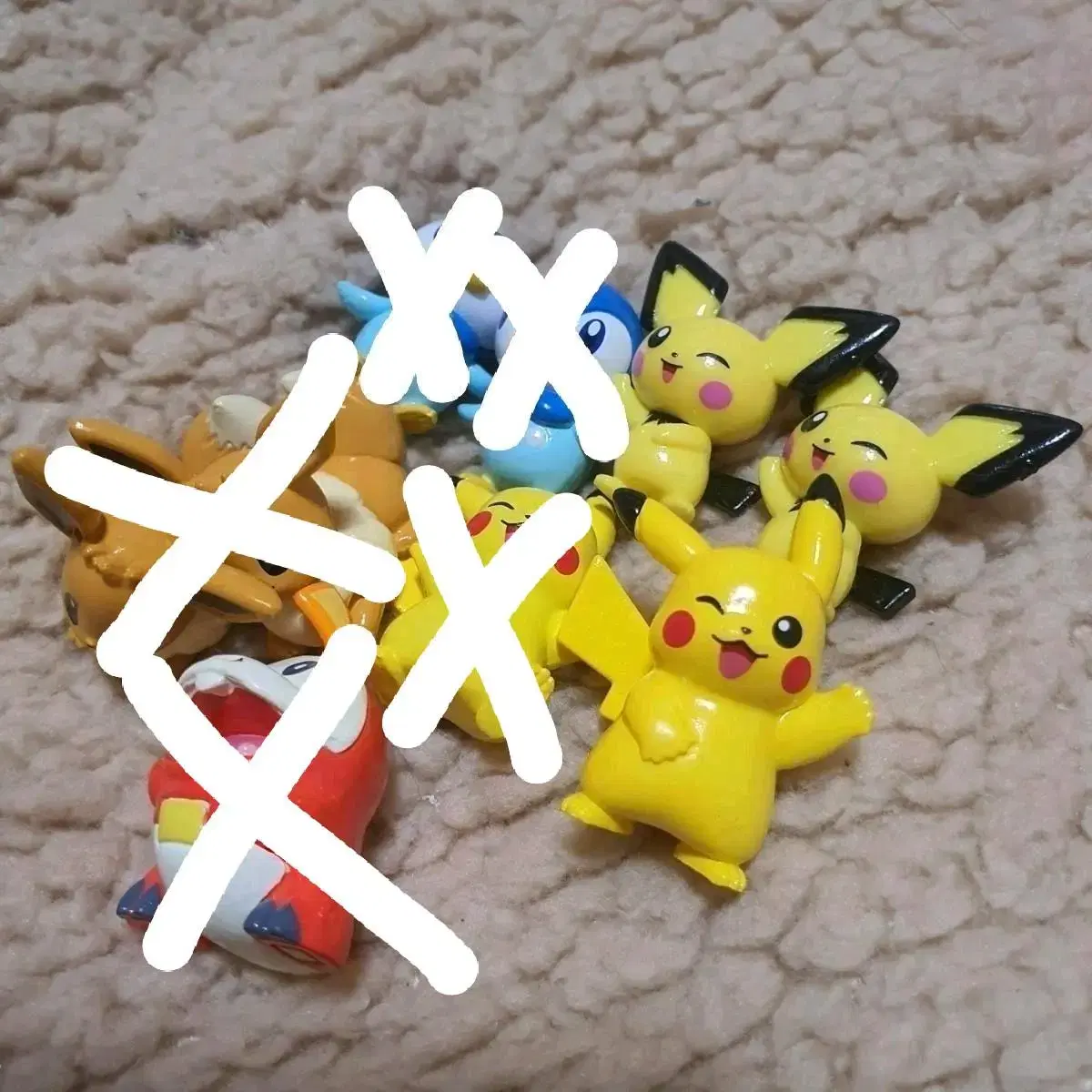 Pokémon bath bomb figurines (Eevee, Charizard, Pidgey, Pikachu, and Charizard)