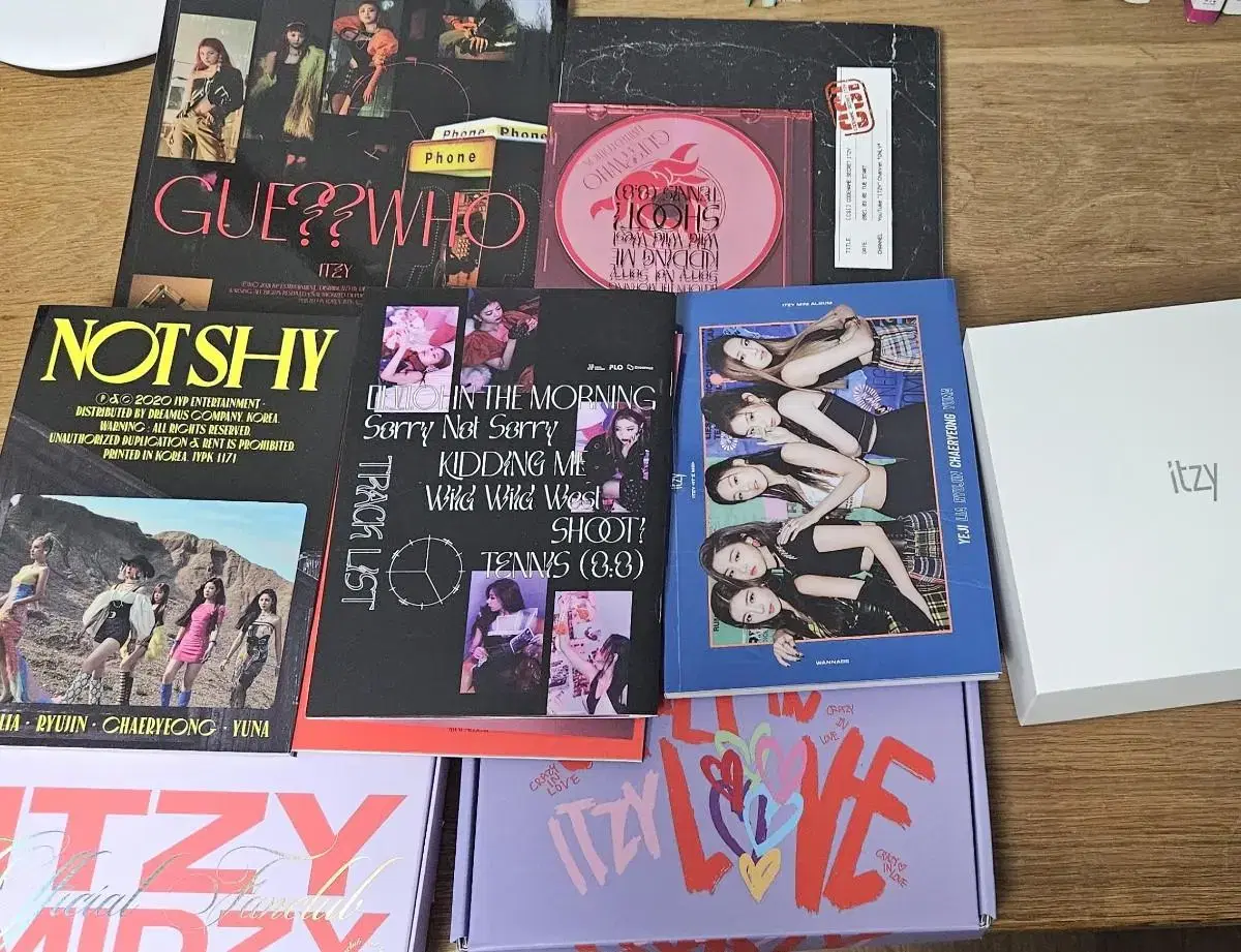 Itzy albums, photocards, and cheering rings for sale!