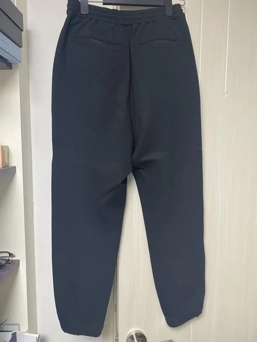 [44] Sells Junji sweatjogger pants.