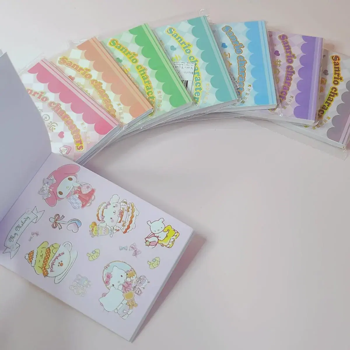 8 Sanrio Sticker Books (24 sheets/230+ pieces) + Sanrio Cutter Knife