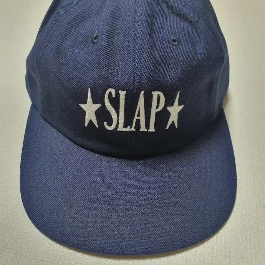 HUF X SLAP 콜라보 볼캡 스냅백 모자 팝니다 (새상품 네이비)