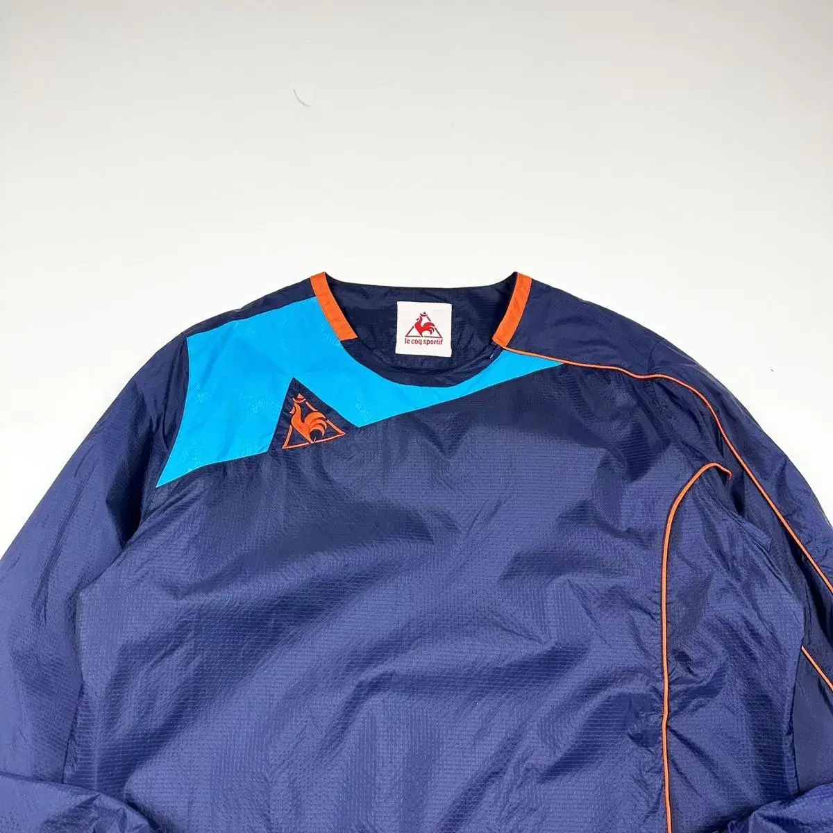 Le Coq Daily Color Matching Windbreaker Warm-up (L)