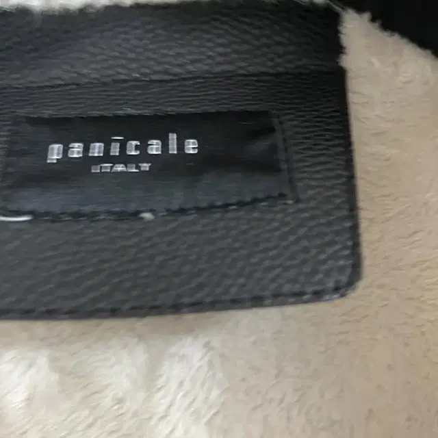 빠니깔레 무스탕 100 (PANICALE 블랙 에코레더 무스탕 코트)