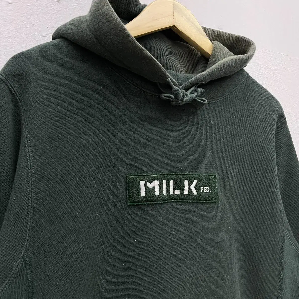 [M] 챔피온XMilkFED 로고 리버스위브 후드티