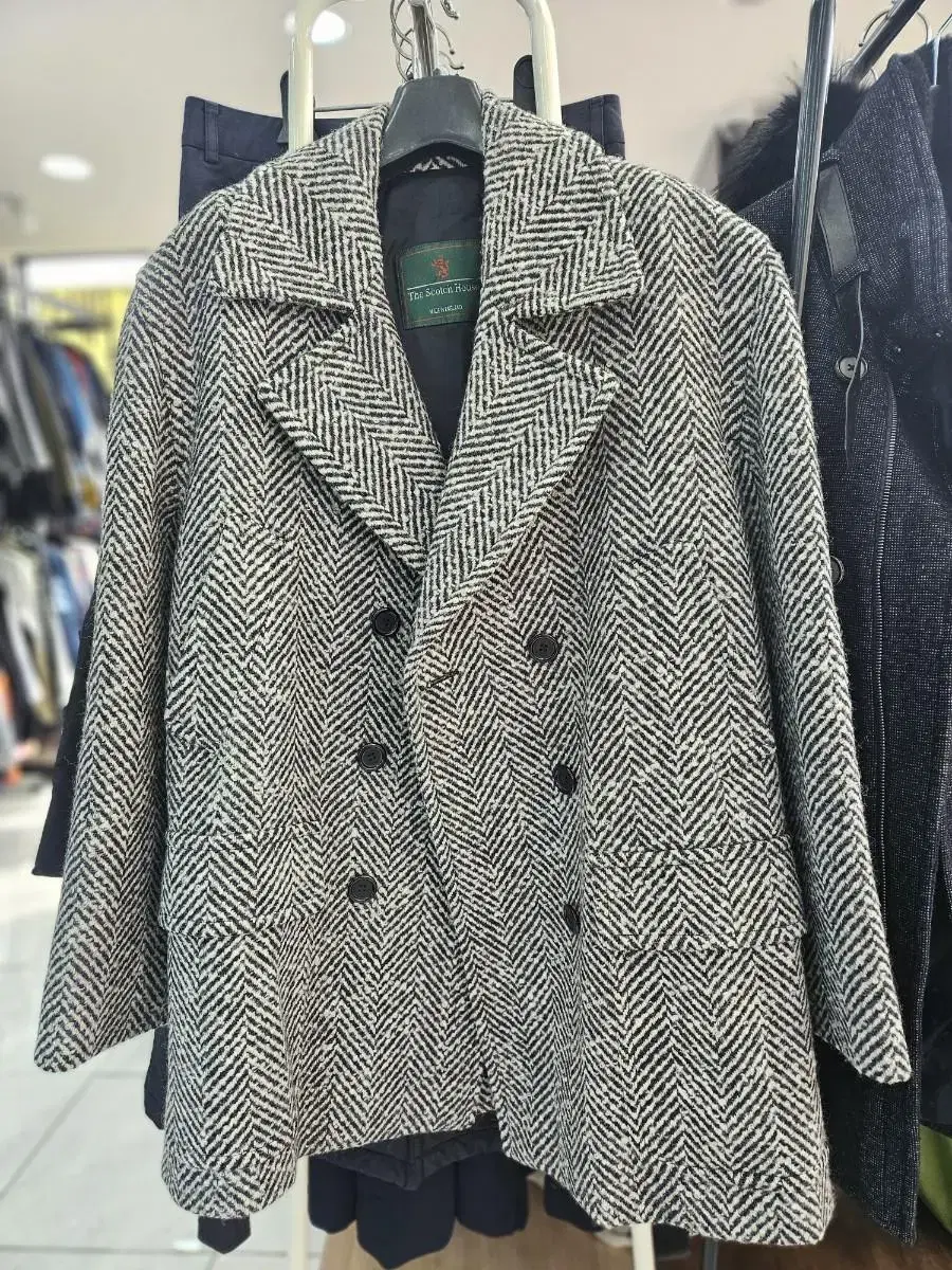 The Scotch House Woolen Coat 105 sells