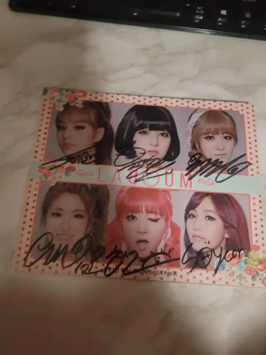 Raboom Signed Album