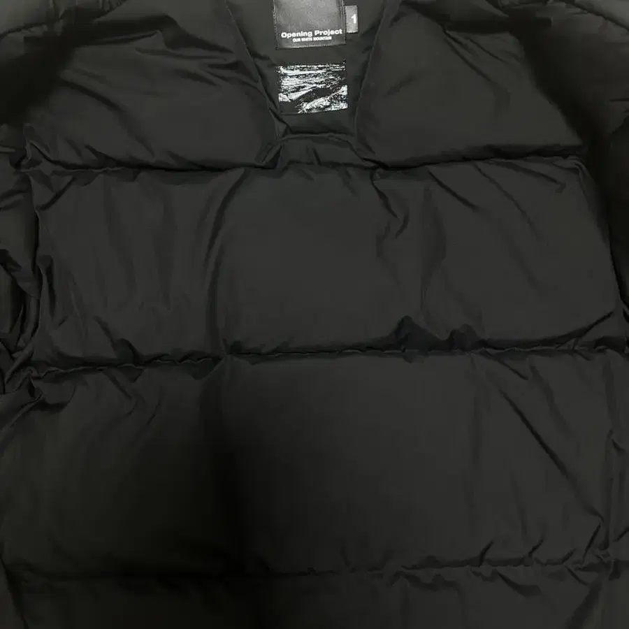 오프닝프로젝트 숏패딩 Geometric Puffer Jacket