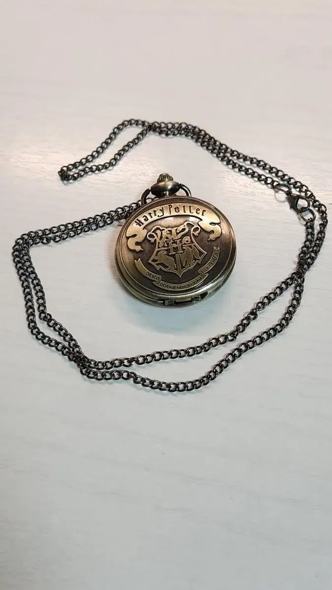 Shipping cost included) Harry Potter pocket watch necklace