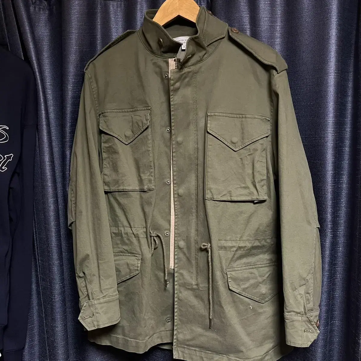 Man in Jungle M-51 Field Jacket