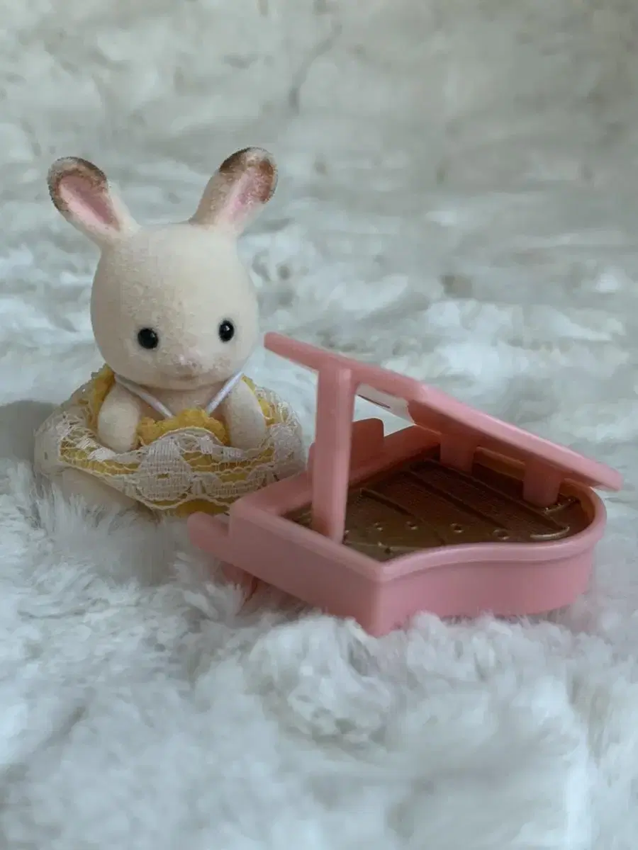 Sylvanian piano-playing baby rabbit