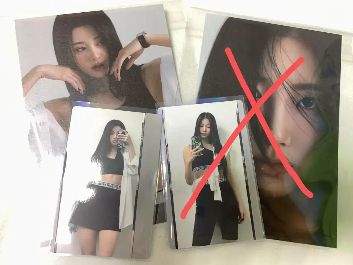 Unforgiven le sserafim yunjin sells official photocards