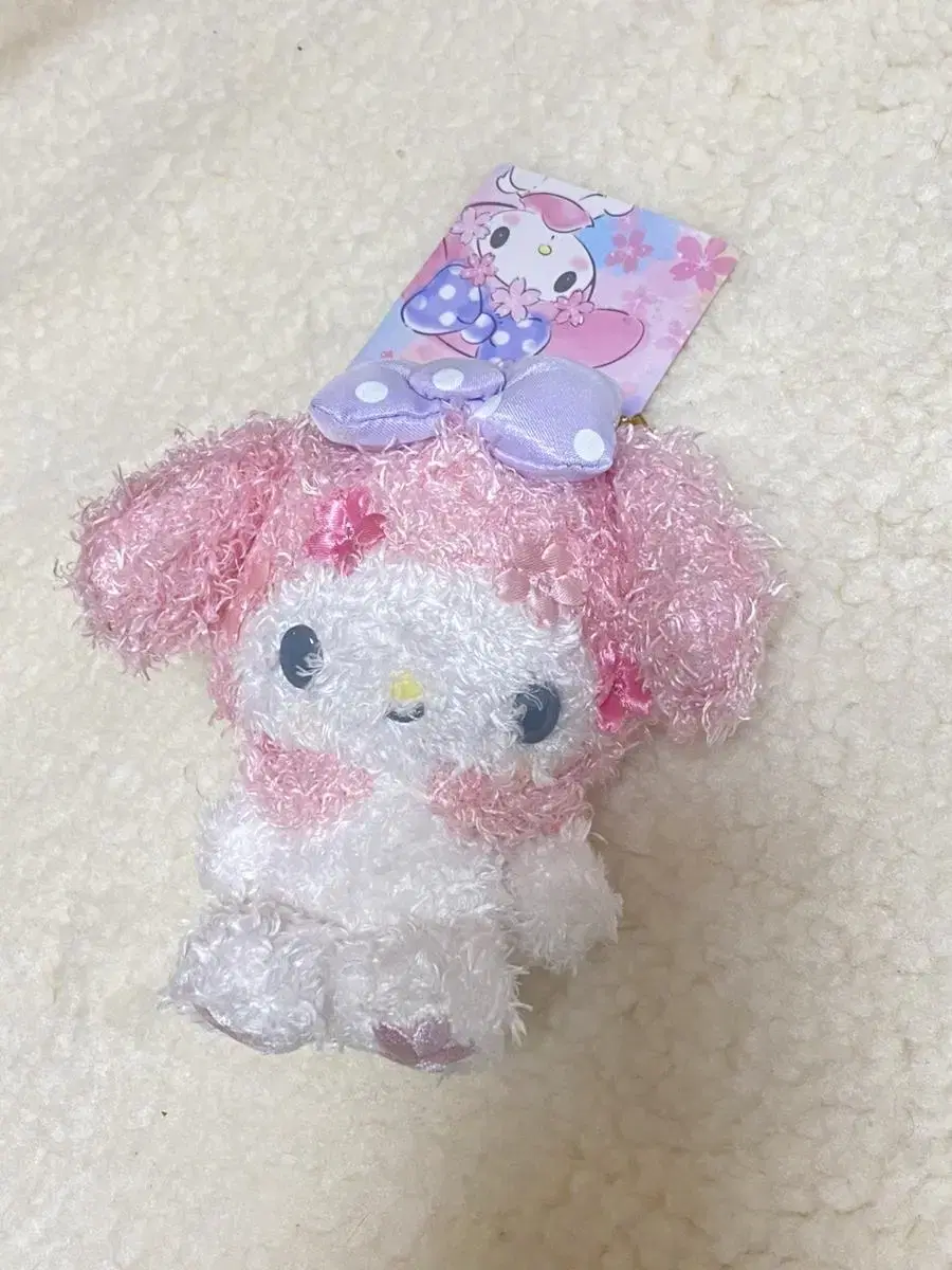 Sanrio Maimelodi Poggle is the doll marmel mascot.