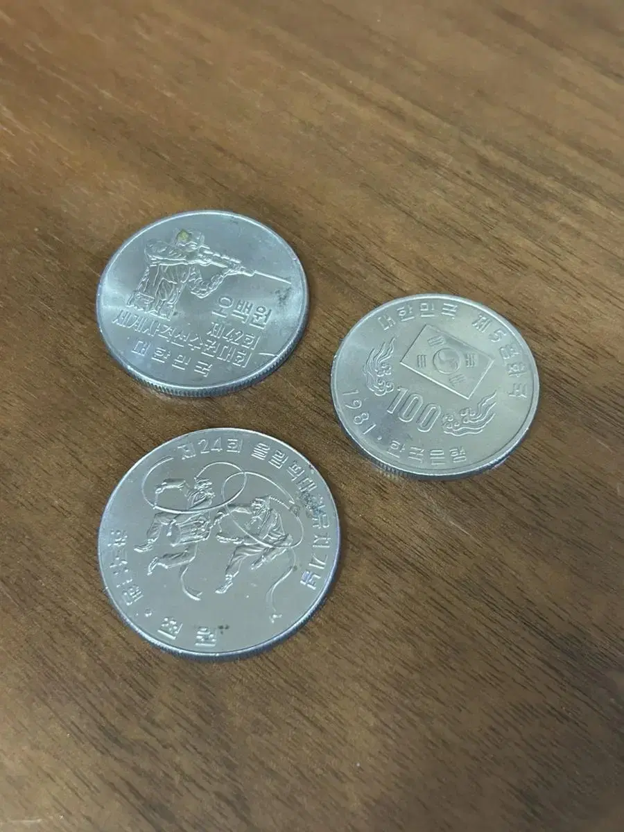 Three commemorative coins for the 1988 Olympics