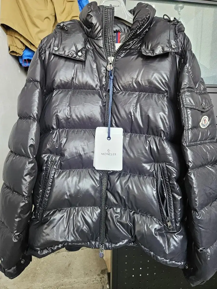 Moncler Maya in glossy black.