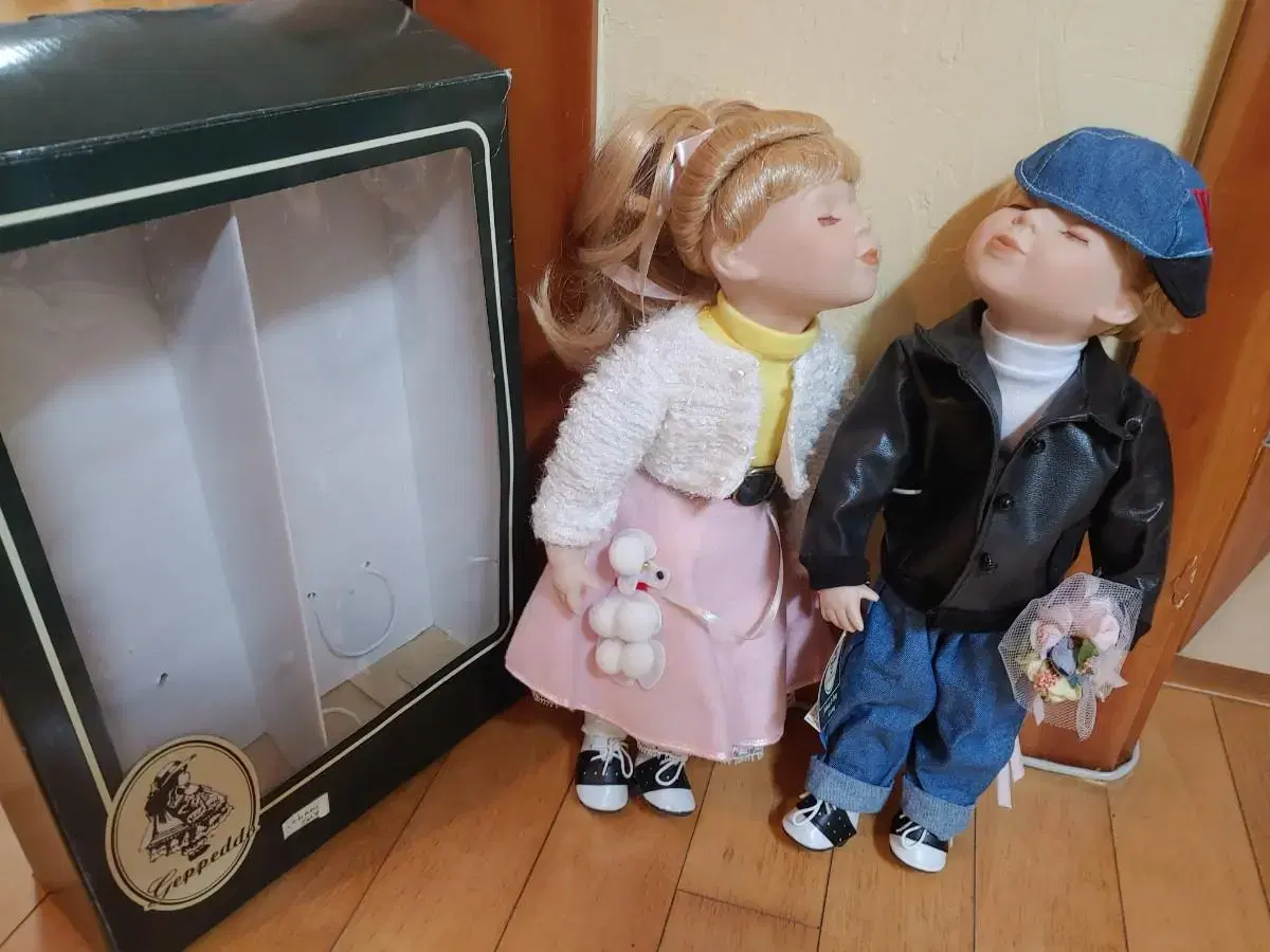 Boy and Girl Kissing Porcelain Dolls