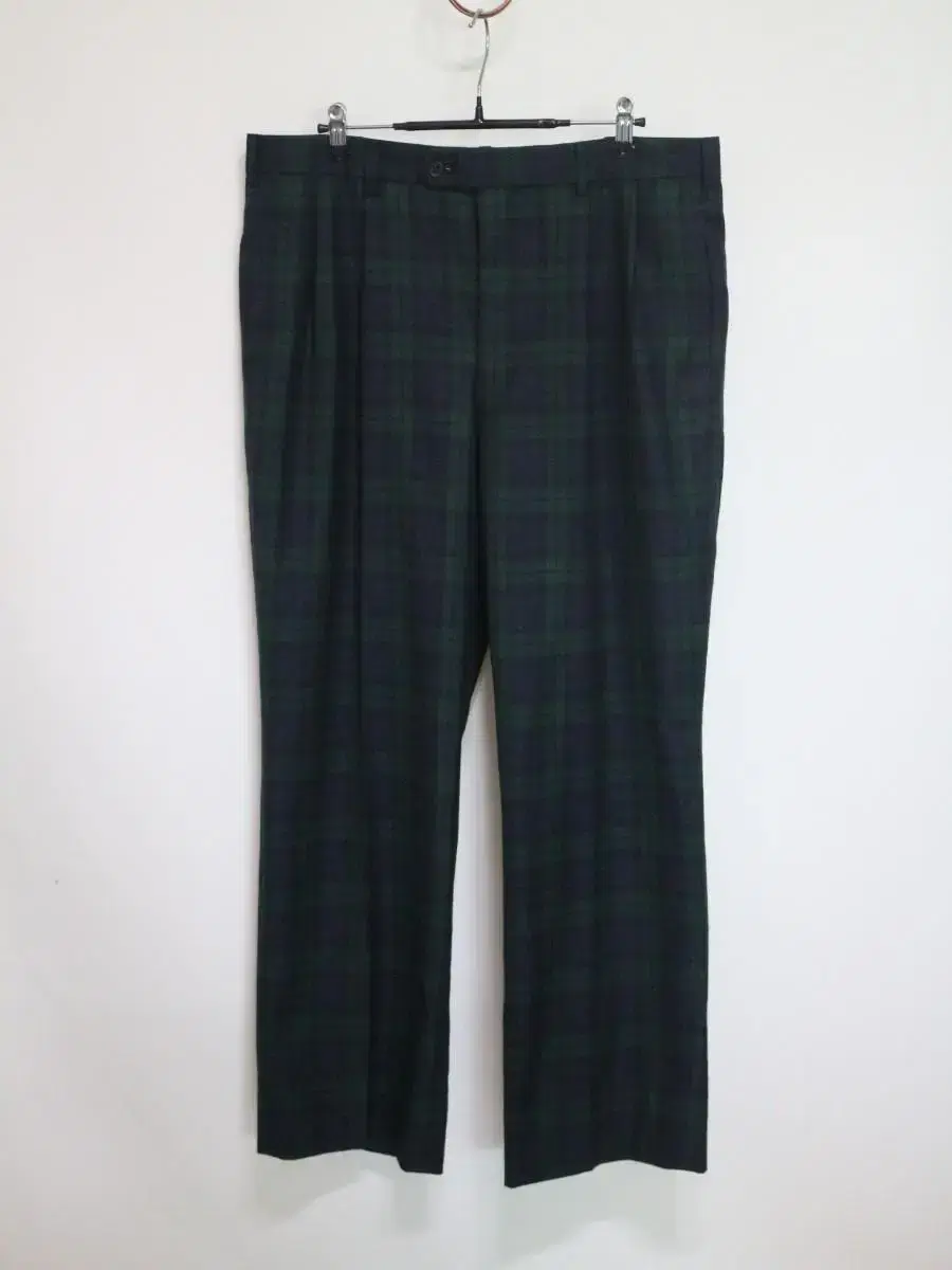 Ken Collection checked wool pants for sale.