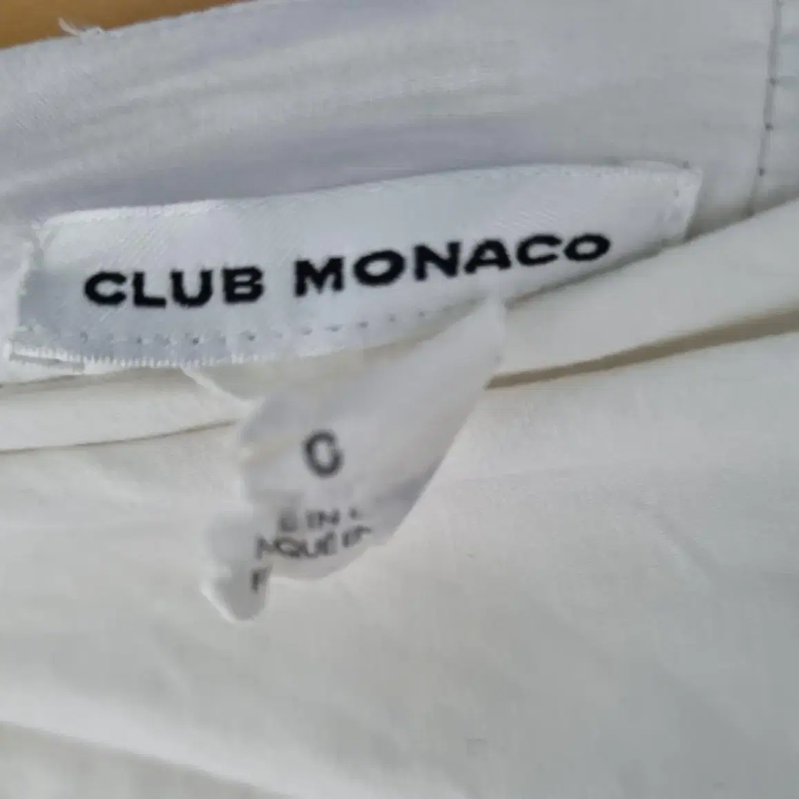 44-슬림55 CLUB MONACO 클럽모나코 프로스트링 언발 스커트