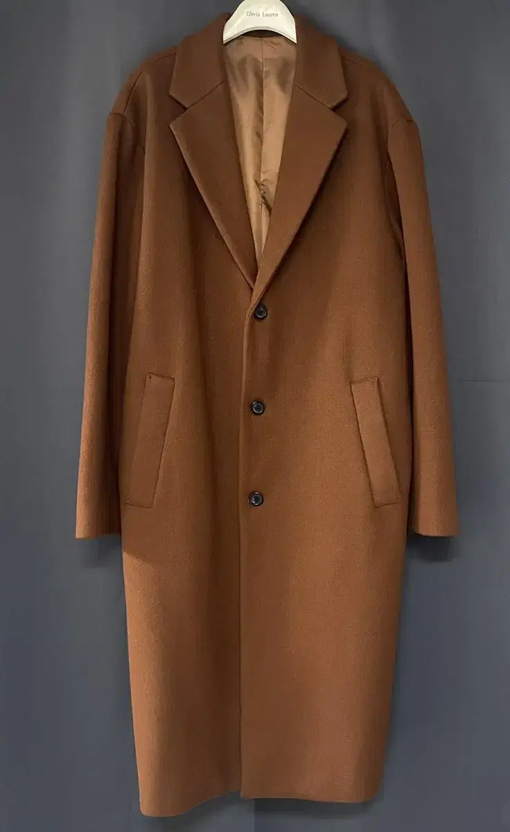 I'm selling an over-the-knee camel coat.