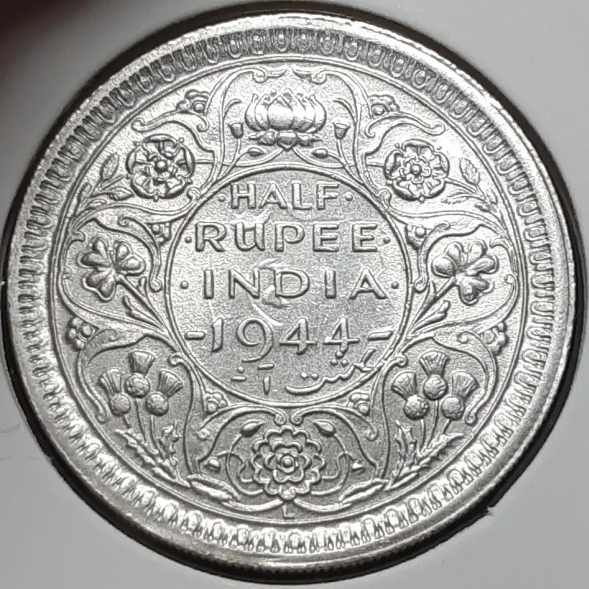 [silver coin] British India unused 1944 half rupee.Foreign coinage.