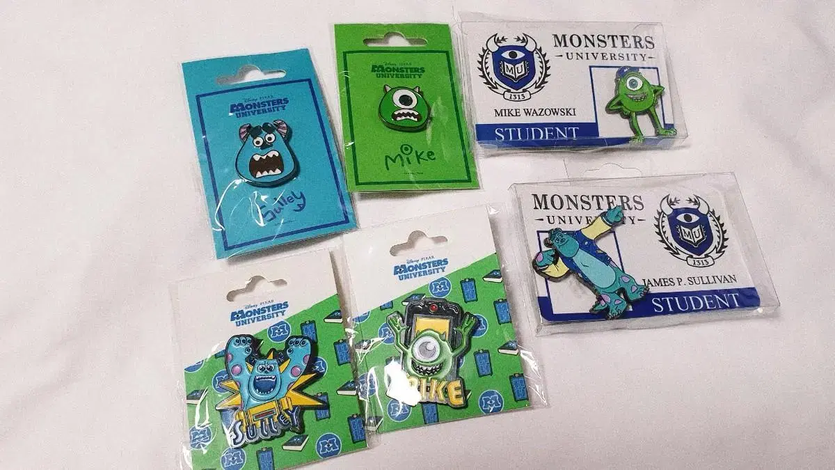 Monsters, Inc. badge Pixar Monsters University badge