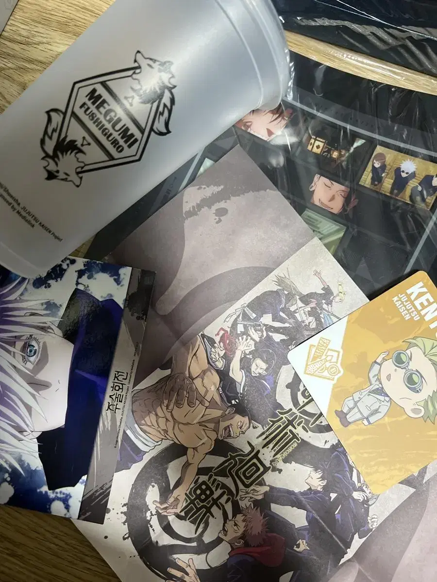 Zuu spinning collaboration cafe reusable cup, gojo keyring, postcard, kuzi clear file