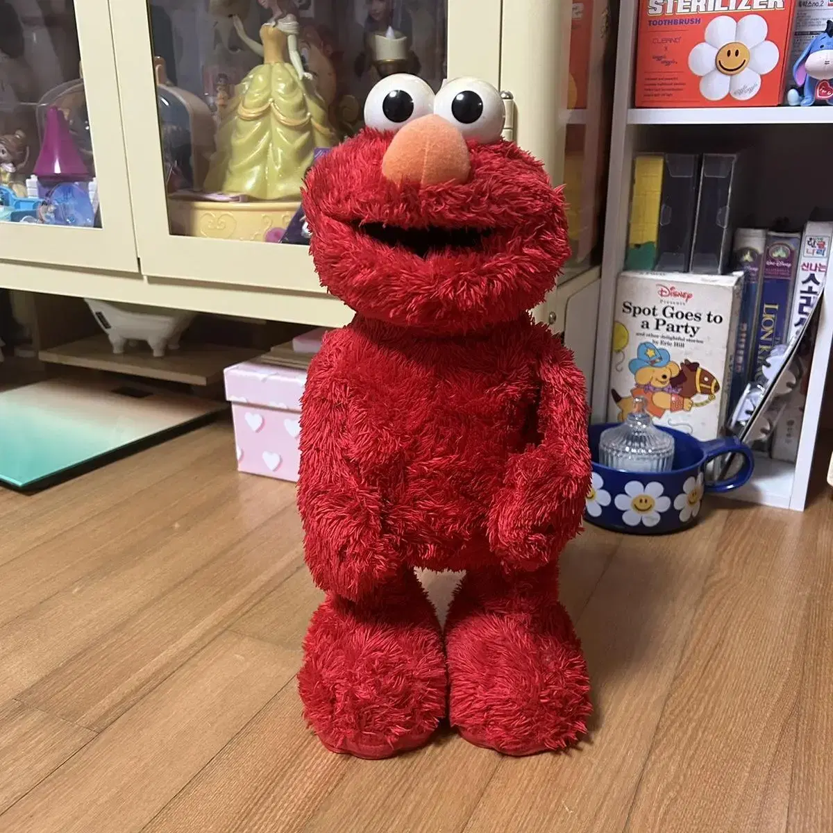 Elmo doll giggles...but breaks...