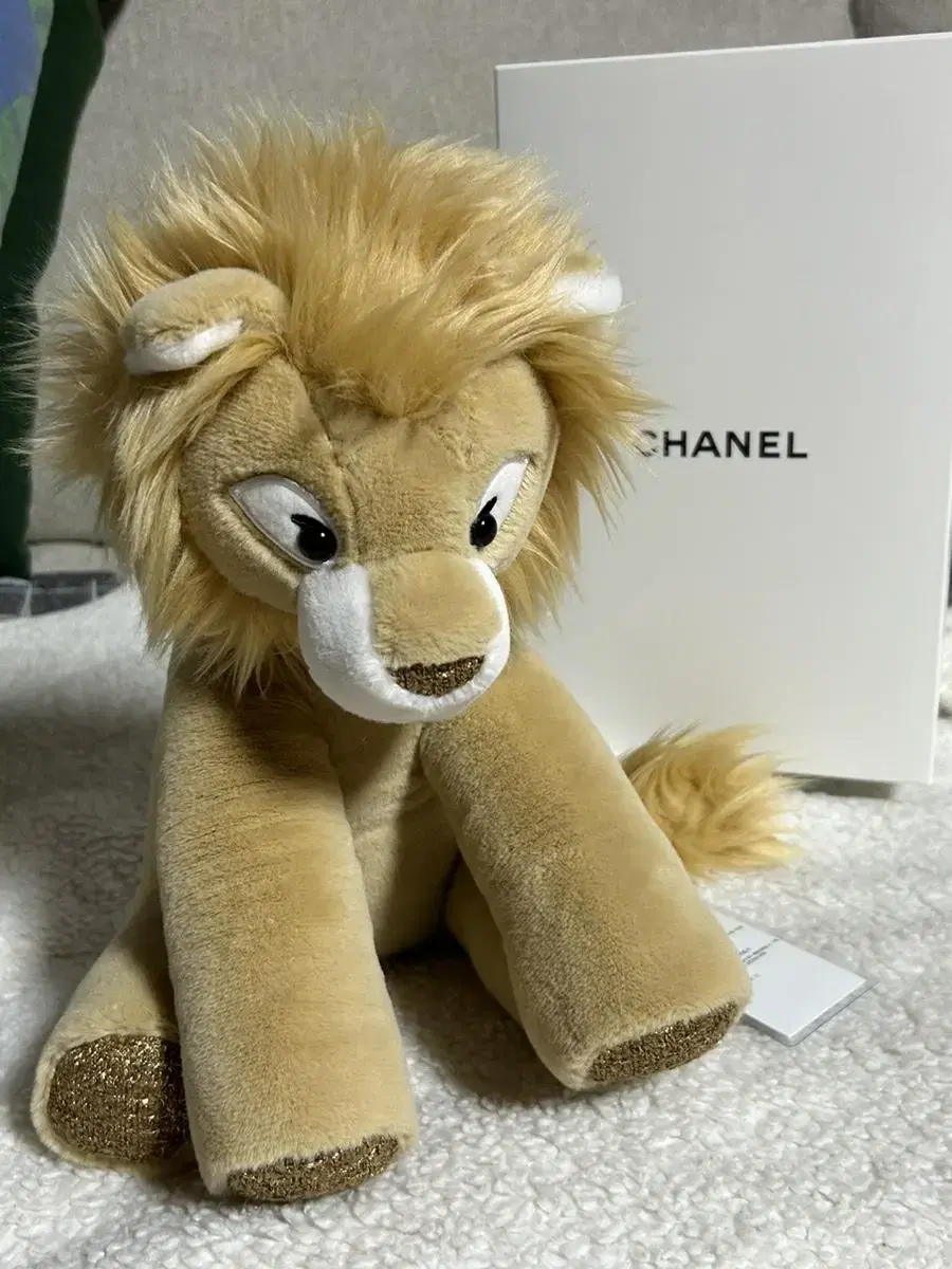 Chanel lioness doll