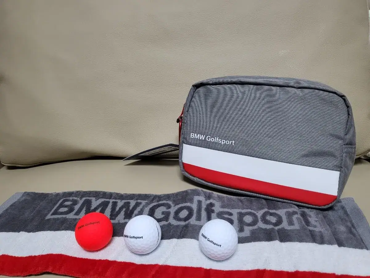 BMWGolfSport pow, ball, and towel,