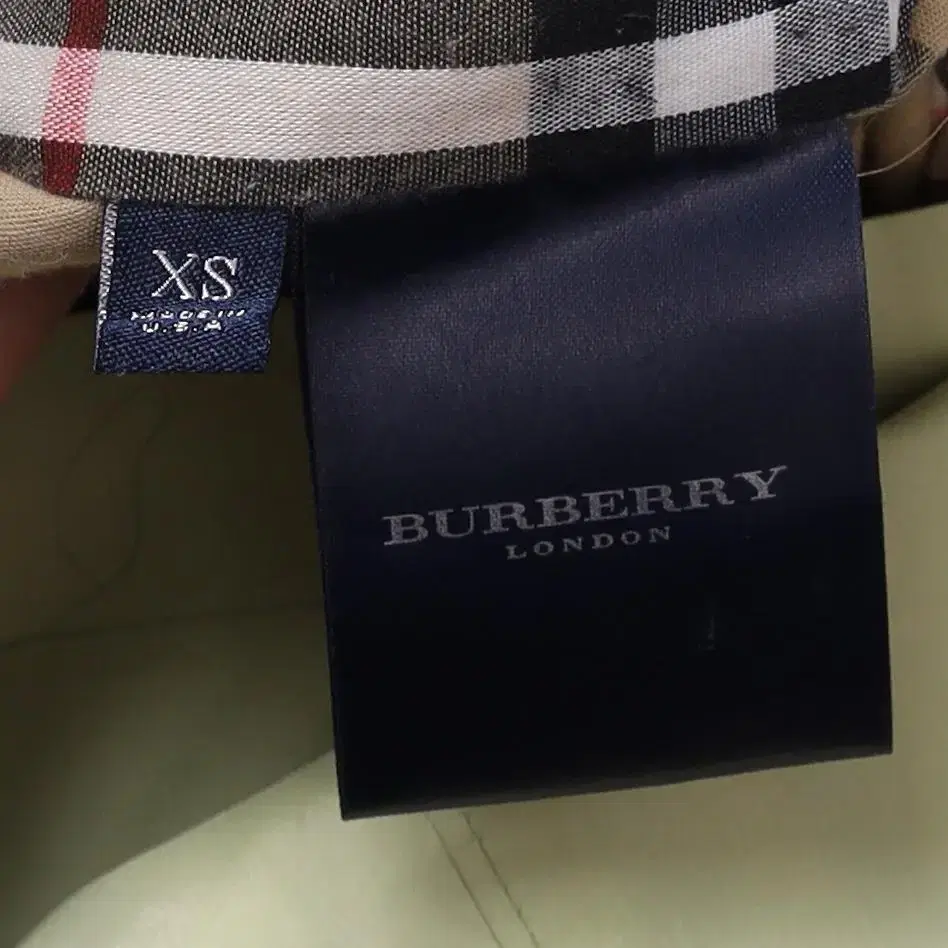 Burberry House Checkered Sleeve PolyCoat