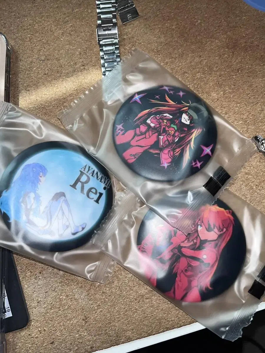 Sells Evangelion Badges (in bulk of 3)